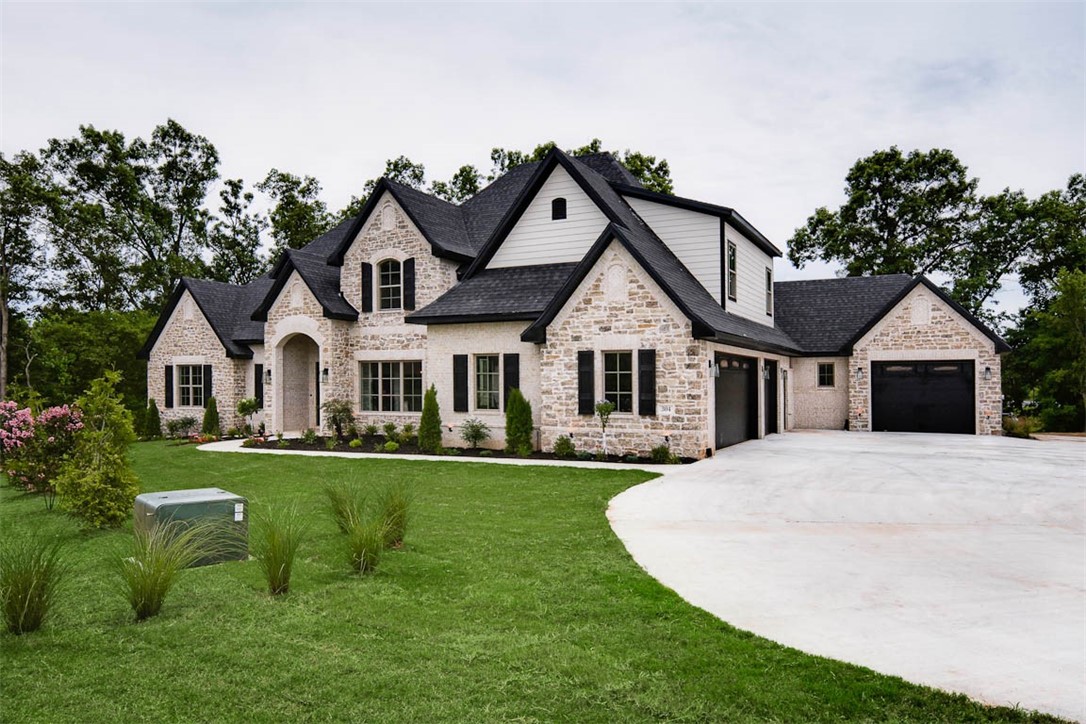OPEN HOUSE SUNDAY 4/18 FROM 2-4 PM! Exquisite home on a flat 1.01 acre lot in West End! 4 car garage! Walking into this home you will find a formal dining & office on your way to the large open living room and kitchen. Ample windows fill the space with an abundance of natural light! This split floor plan also offers 4 bedrooms on the main level. Upstairs, you will find a bonus room, media room, and 5th bedroom. Complete with central vac & speakers! Outside, entertaining comes easy with the outdoor kitchen and huge backyard! West End is gated and within close proximity to Bentonville West. Estimated Completion 6/15/2021