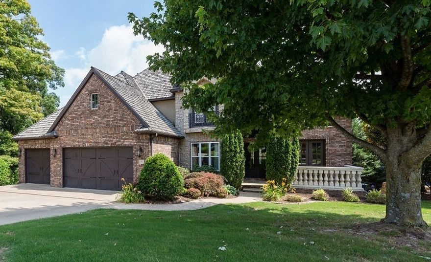 Pinnacle Country Club living with beautiful views of the 5th green and tee box.  Enjoy 5,265 heated sq ft with 5 bedrooms and 4.5 bathrooms, oversized eat in kitchen, formal dining, study, great room w/ incredible views, theater room, wet bar, bonus, separate laundry, and second living.  Amenities include gorgeous hardwood floors, vaulted ceilings, custom cabinetry, all wet bar and kitchen appliances convey, tons of storage, double crown molding,  beautiful outdoor living space w/ a fire pit and koi pond, and a 3 car garage.  Basement has a heated and cooled room w/ French doors to accommodate a golf cart. Community pool and tennis court.  Zoned for Bentonville schools.