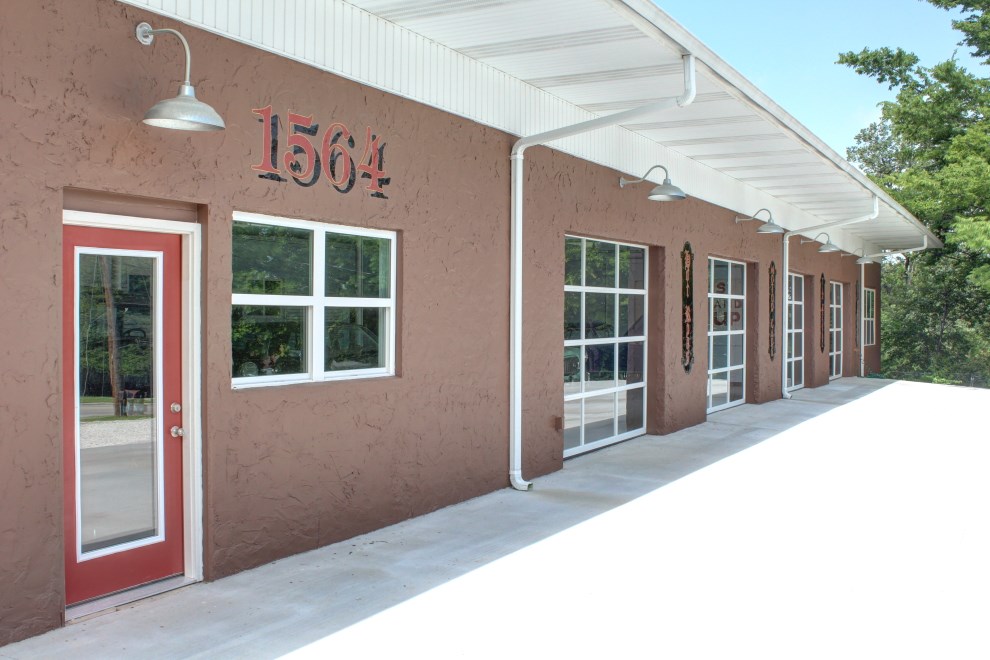 Newly restored 1 bedroom home with living room, kitchen and all appliances connected to a mechanical garage that may be used for multiple purposes and zoned for community services. Attached garage has workshop with room for most any need and has four showroom style glass garage doors giving access to a showroom that could be retail space, plumbed for commercial air, HVAC in front showroom with additional heat in back room. Perfect location to live and have a business at the same location.