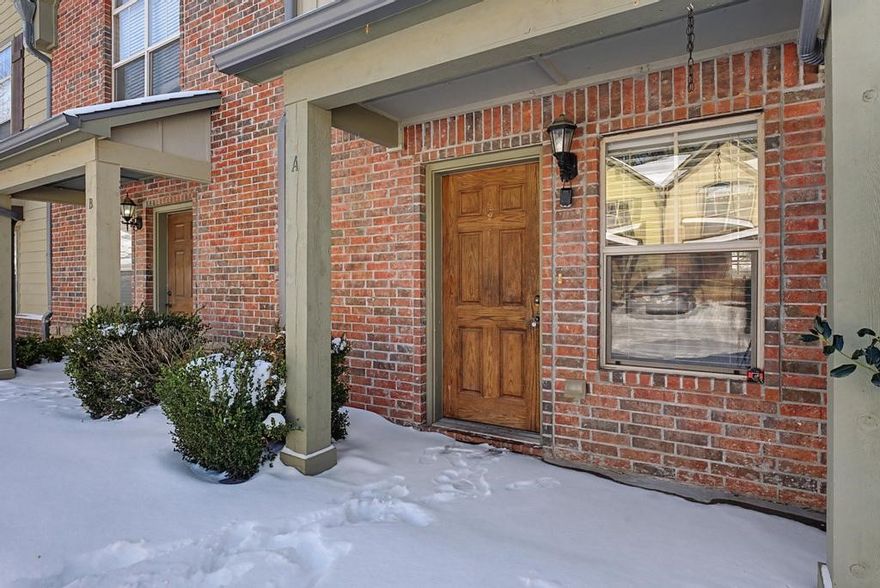 Welcome Home or Excellent Investment.  The location is close to everything you would want or need.  Newly installed luxury vinyl plank in the living area and carpeting for the upstairs.  Each bedroom has a private full bath.  All appliances remain - washer, dryer, refrigerator.  Electric fireplace and outlets above the mantle.  Agent is related to seller.