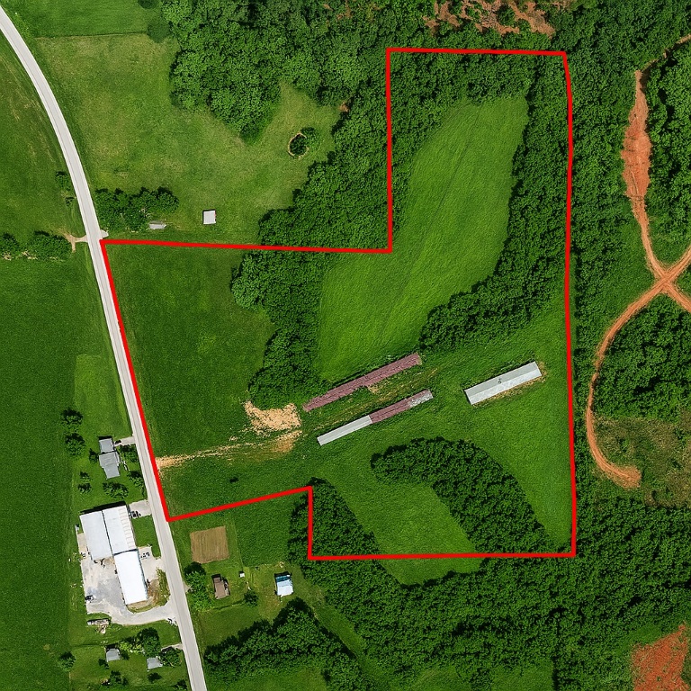 A total of 28 acres across two parcels (18-09672-000 and 18-09671-000), located approximately 1/4 mile from Centerton city limits. Water is available across the street. Property under Benton County approval for a plat map with 19 lots, which will be provided to the buyer. Suitable for various development opportunities, including potential commercial use.