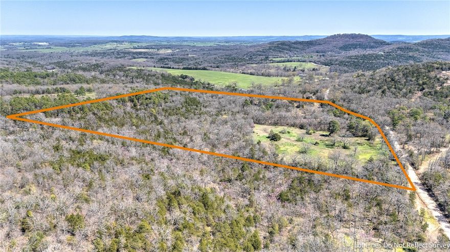 Rarely does an opportunity like this come along! Located in the scenic beauty of Eureka Springs, this expansive 33-acre property offers both privacy and versatility, making it the perfect canvas for your next project. Whether you’re dreaming of a private retreat, a sustainable farm, or a custom development, this property has everything you need and more. This beautiful parcel features a perfect balance of cleared and wooded areas, offering a serene setting with ample space to build, farm, or explore. It is also suited for agricultural endeavors, from farming to livestock, or simply enjoying the peace of rural living.  Utilities are conveniently accessible, with electricity already at the street, making development straightforward and efficient. Whether you're creating a private estate, a working farm, or a planned development, the potential here is limitless. Don’t miss the chance to make this unique property your own!