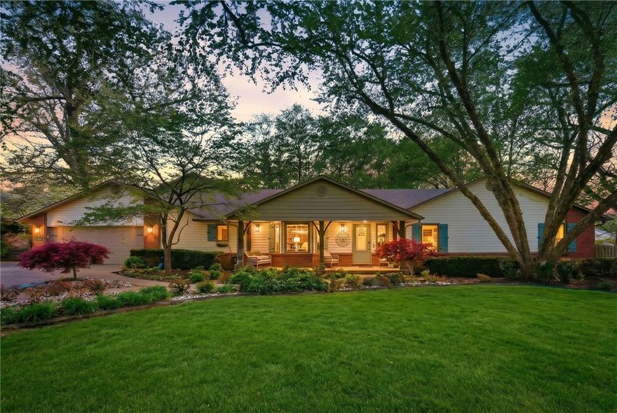 A home of this caliber is RARE!  Tucked on a quiet cul-de-sac, on nearly an acre, with easy access to Fayetteville, Springdale, this stunning home has been thoughtfully partially remodeled.  Nearby biking and walking trails.  Abundant storage throughout! The spectacular primary suite features a spa-inspired bath with freestanding tub, dual-head tile shower, exquisite golden vanity fixtures, and an expansive closet with center island and shoe closet. Three interior fireplaces. Guest quarters off the garage offer kitchenette, dual-sink bath, walk in shower, large closet and washer/dryer hookups. 4 1/2 baths inside. Outside, a saltwater in-ground pool with diving board and slide, pergola lounge, wood-burning fireplace, and full pool bath create an unmatched resort experience. A 17×10 storage garage and lush landscaping front and back complete this extraordinary property.