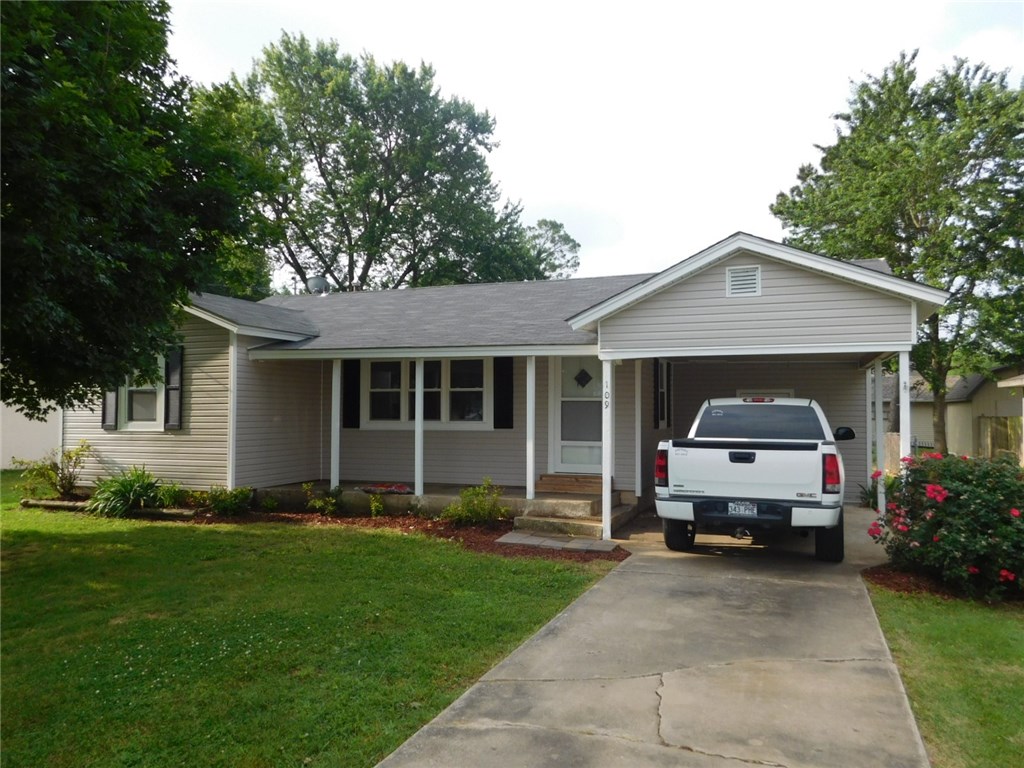 Cute house in Prairie Grove. Move-in ready. Hardwood floors, new paint and appliances. Nice level lot across from the school. 2 BR, 1 BA, newer roof and windows.