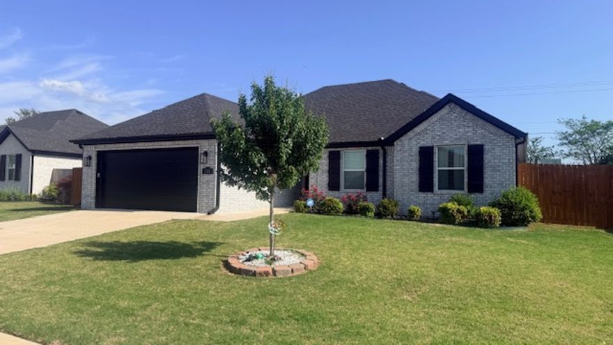 Great home, nice upgrades close to Farmington Schools.  Wagon Wheel Crossing Subdivision Phase 1.  Beautiful 3 bedroom 2 bath, covered back porch, stainless appliances, good sized  lot, all brick, gas log fireplace, walk in shower with 2 closets in main bedroom.  You will not be disappointed, perfect location to all Northwest AR has to offer.