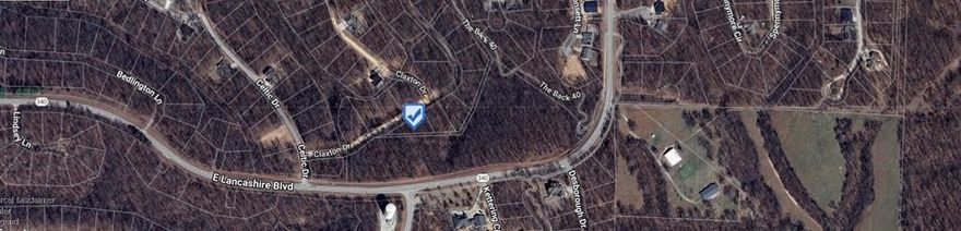 Location, location, location. Close to the Tower Trail, ~300 ft away, SBAT, and Back 40 Loop Trail Heads! Bentonville Schools. Very private with only one adjacent neighboring lot on the East property line. This is a very buildable lot with a slight upward slope. Three-bedroom Perc test available upon request. Quick access to Hwy 340/East (Lancashire Blvd). It's NE Bella Vista with quick access to all NWA via 71-B/Bella Vista Way, to I-49, Bentonville, Rogers, or via Hwy 94 through Pea Ridge and into Rogers. Lot corners flagged pink/orange for your convenience. Showings by appointment only. Friendly seller financing is available!