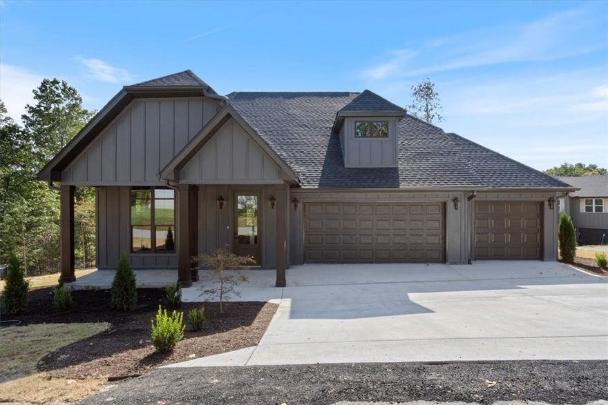 Located minutes from Highlands and Scotsdale Golf Courses, Loch Lomand, and Branchwood Rec Center this gorgeous New Constuction is Filled with stunning upgraded features: High-end Quartz counters throughout, white oak cabinets on Kitchen Island and in Primary Bath, Built-In Beverage Center with undercounter wine/bev fridge, and a breath-taking, covered deck with integrated heaters to keep you warm in those chilly Winter months! This home features 3 Bedrooms, 2.5 baths plus an office, abundant storage and customs built-ins, a spacious 3-car garage and it's on a double lot for a total of .69 acres! Come see this one today.