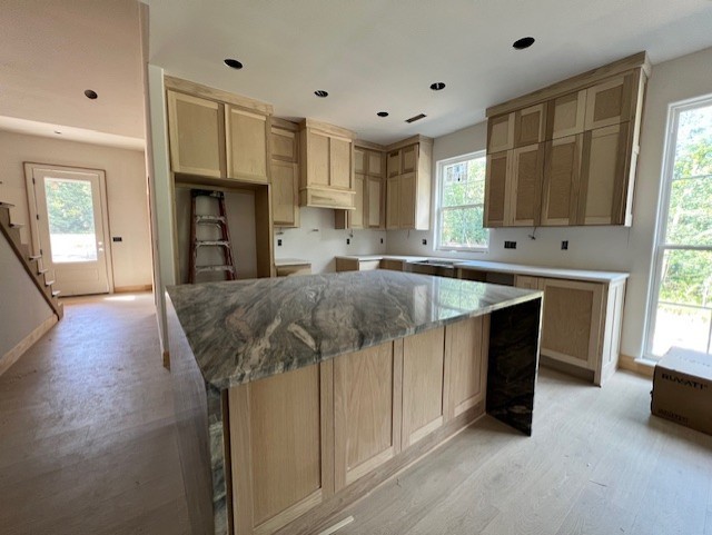 New Construction Home nearing completion! Located minutes from Golf and Branchwood Rec Center and Filled with stunning upgraded features: High-end Quartz counters throughout, white oak cabinets on Kitchen Island and in Primary Bath, Built-In Beverage Center with undercounter wine/bev fridge, and a gorgeous, covered deck with integrated heaters to keep you warm in those chilly Winter months! This home features 3 Bedrooms, 2.5 baths plus an office, abundant storage and customs built-ins, a spacious 3-car garage and it's on a double lot for a total of .69 acres! Come see this one today.