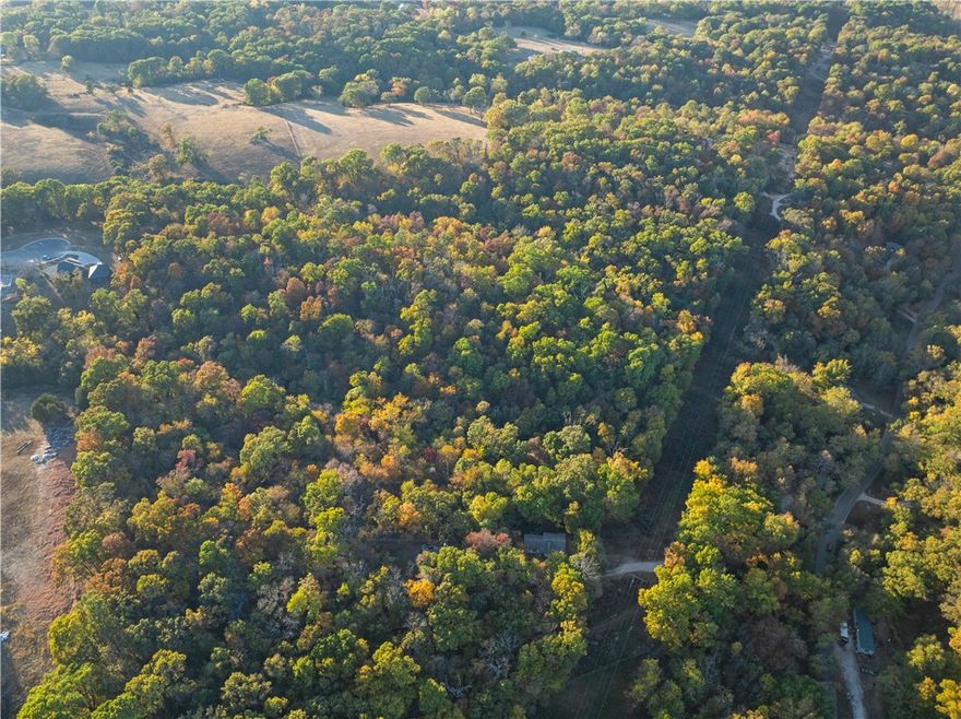 Discover over 29 acres of prime land offering endless possibilities! Located off Rader Road, this expansive property features two 50' ingress/egress easements, ensuring easy access for future development. Whether you're looking to build your dream home with privacy and space or develop multiple homes, this property provides the perfect setting. Enjoy the beauty of nature while staying conveniently close to local amenities. Don't miss this rare opportunity to own a versatile piece of land in a growing area! The flexibility of the surveyed layout, offering 5-6 acre options, makes it perfect for personal use or development, whether for a dream home, a subdivision to name a few.

The lack of restrictions and access to rural water are huge advantages for potential investors. Plus, the proximity to Big Sugar Golf Club will attract outdoor enthusiasts, enhancing its appeal. This unique blend of privacy and convenience could lead to many exciting possibilities!