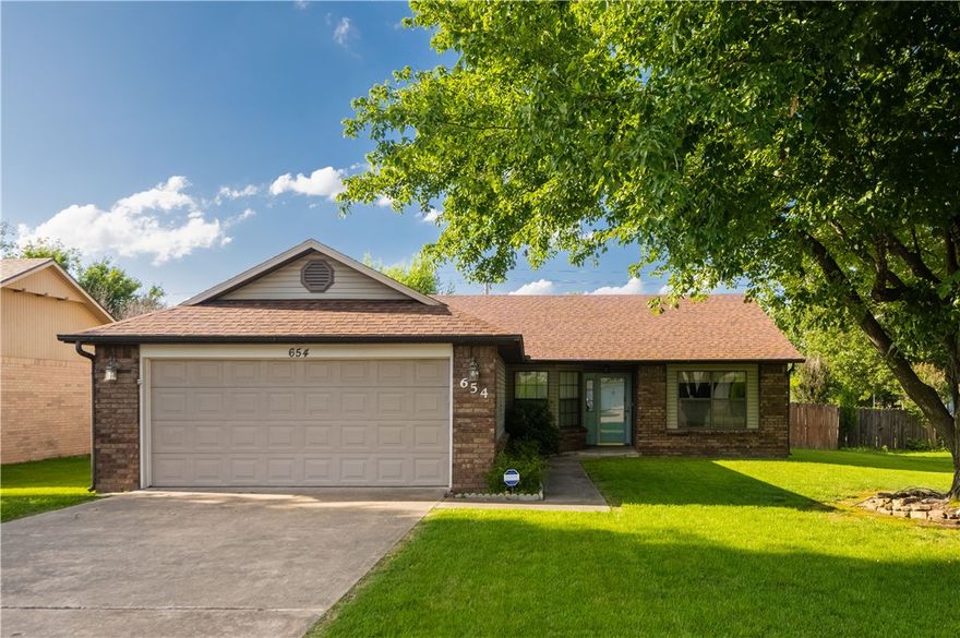 Adorable, centrally located 3 bed/2bath home with 2 car garage and fenced backyard. Close to shopping/dining, 2 minute drive from Tyson Headquarters, bikeable to Lake Fayetteville or downtown Springdale with the greenway about a 5 minute bike ride away. Located just off of highway 71 in a peaceful neighborhood, this home boasts luxury vinyl plank floors through out, granite counter tops in the kitchen, a spacious primary bedroom with ensuite bathroom/huge closet and a covered back patio. Call today to schedule a tour! Property is agent owned.