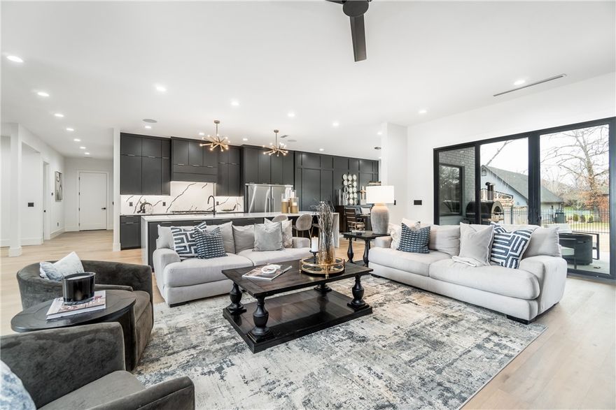 Discover the epitome of luxury in this meticulously crafted home featuring lavish quartz countertops, designer hardwood flooring, and exquisite tile throughout. The home was completely remodeled in 2022. Indulge in Fisher & Paykel appliances, Moen fixtures, and designer light fixtures that adorn every space. Embrace entertainment with Klipsch built-in smart sound, a media room with a wet bar, and a courtyard boasting a wood-burning firepit for gatherings. Smart features like WiFi boosters, digital thermostats, and a smart HVAC system enhance comfort. This home boasts an executive office, a gourmet kitchen, spa-like bathrooms, and an array of amenities including a gym, playroom, and custom millwork. With a pool design approved by the HOA, Ring doorbell, exterior security cameras, and a new 30-year roof, this contractor's personal home exudes grandeur and functionality in every detail! Interior + exterior furniture and appliances can convey with the property.