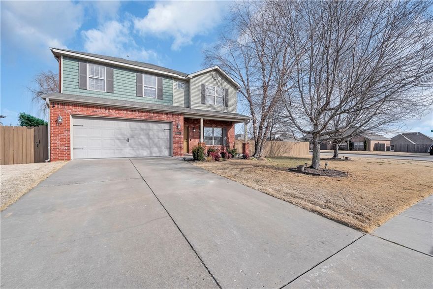 Welcome to 5001 Bay Court in desirable Lakewood Crossing! This beautiful 4-bedroom, 2.5-bath home offers 2,815 square feet on a corner lot. Built in 2012, the home features granite counters, built-ins, and a gas fireplace. The spacious, eat-in kitchen includes two ovens and a pantry. Enjoy the stained concrete patio overlooking your private, wood-fenced backyard—ideal for relaxing after a bike ride on the nearby Razorback Greenway. Downstairs boasts hardwood floors and walk-in closets. Location is everything! The brand new roof (2026) offers peace of mind for years to come. Walk  to Janie Darr Elementary, making drop-offs easy. You're minutes from Pinnacle Hills shopping, dining, and entertainment. With mature landscaping and a fantastic Rogers location, this home offers the complete package. Don't miss this opportunity to own in Northwest Arkansas's most sought-after neighborhoods!