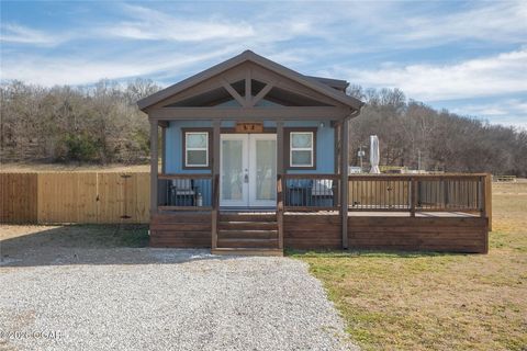 Photo of 112 Cottage Brook Circle, Anderson, MO 64831 (MLS # 1339313)