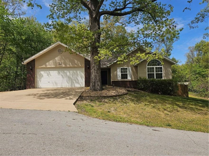 Charming single family rental with easy access to biking and hiking trails for the outdoor enthusiast! All new LVP flooring throughout. Freshly painted living room, dining room, kitchen and guest room. Located on a quiet street, surrounded by trees, this lovely home features a soaring cathedral ceiling in the living room with corner gas log fireplace. Lovely granite counters and stainless steel appliances in the kitchen. Master and ensuite bath with walk-in closet. Two guest bedrooms and shared bath. You can enjoy the peacefulness of the outdoors on your covered patio, or maybe roasting a marshmallow in the fire pit, all in the privacy of the fenced back yard! One small dog under 25 lbs. will be considered with pet deposit. No cats allowed.