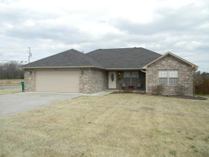 Cute cute cute! This 3 bedroom 2 bath home is three years old and in mint condition. This home sits on a corner lot and features a split bedroom floor plan, trey ceilings, ceramic tile, & yard sprinkler system. The privacy fenced back yard is unbelievable with a cover patio perfect for grilling & relaxing, in-ground rock fire pit, & rock waterfall. Come see today.