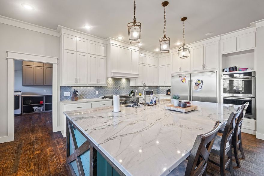 Only 30 minutes to HO and 20 minutes to Downtown Rogers. Nestled on close to 3 acres this 4375 sqft, 4 bed, 3 bath, plus office/bonus room blends rustic charm with modern comforts with a massive front porch, high ceilings, custom cabinetry, and inviting chef's kitchen. Picture yourself whipping up feasts in this culinary sanctuary: multiple ovens, gourmet gas range top, colossal island, farmhouse sink, and sub-zero fridge with tons of storage space. Beyond the kitchen, step outside and dive into your saltwater pool or melt away stress in the hot tub. This property is well equipped to gather loved ones around the crackling outdoor fireplace or roast marshmallows under a canopy of stars by the firepit. The primary suite boasts double closets, a huge walk-in shower, and easy patio access. Notice the utility room with it's own floor-to-ceiling cabinets, workstation, and sink. This isn't just a house, it's a lifestyle! Rediscover the simple joys of country living!