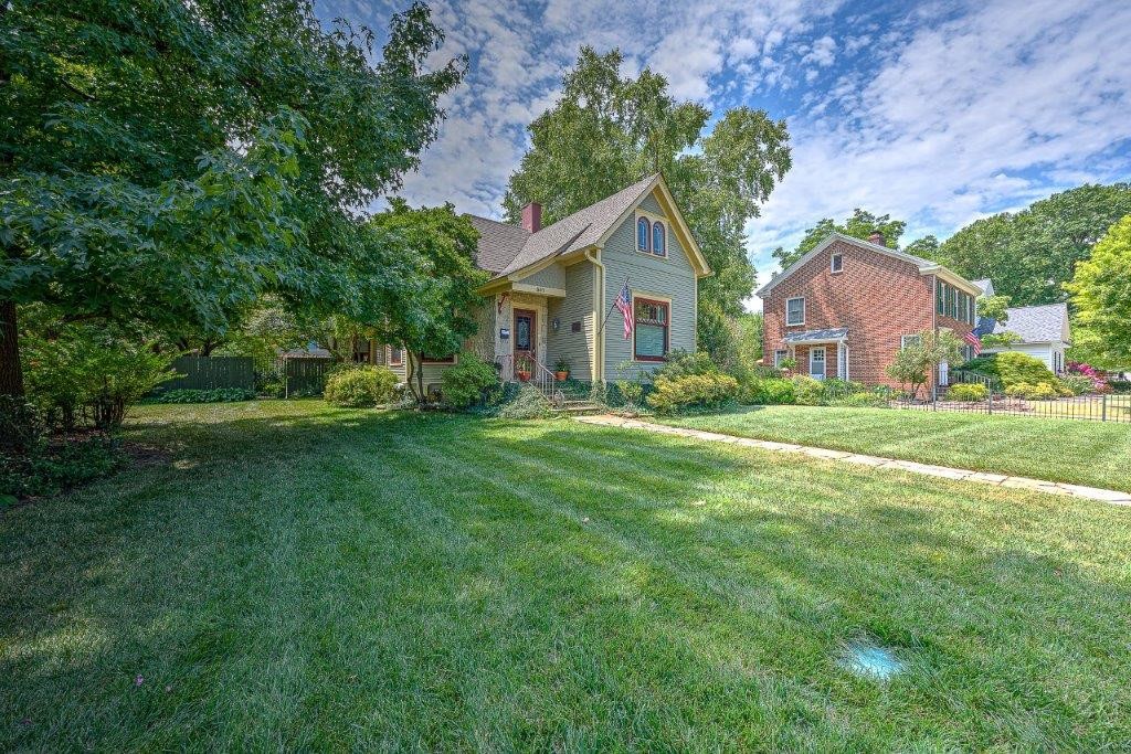 Historic Charm with Modern amenities throughout. One of the most sought-after locations in NWA. Steps to Bentonville Square. Main house has 2525 sqft with 3bd 3ba. Professionally designed and decorated with extensive updates throughout. Home features office area, cozy den, large dining space & sunroom. Wet Bar & wine cooler in Remodeled Kitchen. Primary bedroom on main level w huge walk-in closet adjoining laundry room. Marble walk-in shower in Primary Bath, Claw foot tub in guest. Guest House is 1230 sqft. 1 BR/2BA with large living area & climate controlled wine cellar. Huge Double Lot! Separate 3 car garage. Large Patio and private yard for entertainment.