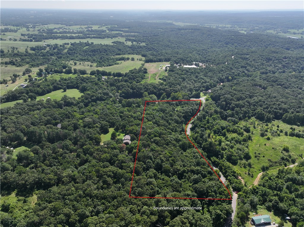 8.9 acres off Highway 16 and Waukesha waiting to be your home place. There are a couple of building sites. The land is sloping but you could have an awesome view at the top of any one of the hills. 1317 Ft. on north side of property, 391 Ft. on west side of property, 1394 Ft. on south side of property on Waukesha, and 375 Ft. on east side of property on Hwy. 16. City will finish 8 inch water line this year. Water tap will be about $1600.