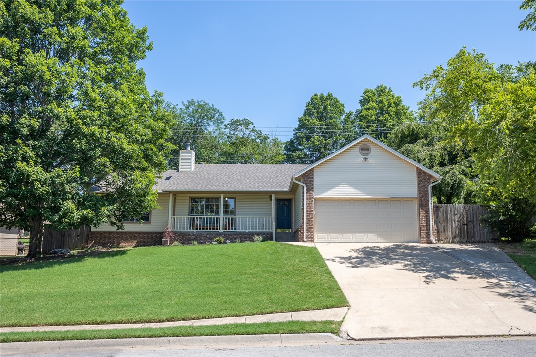 Welcome to 2472 W Jane Circle, where comfort meets convenience in one of Fayetteville’s most accessible locations. This 3 bedroom, 2 bath home offers effortless access to Joyce Blvd, I 49, Hwy 71, and the Razorback Greenway trail, making work commutes or weekend rides a breeze. Inside, you’ll find a cozy living room anchored by a fireplace, a light filled layout with generous windows, and a spacious primary suite featuring a huge walk in closet. Enjoy morning coffee on the covered front porch, or wind down in the private fenced backyard with raised garden beds and no rear neighbors. With excellent curb appeal and a warm, functional layout, this home blends livability and location in all the right ways.