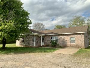 One of few 4BR homes located on a large 1+ acre established lot in Lamar which includes a 30x30 red-iron metal shop, fenced area for the pets, &many updates for the family. Updates include: Kitchen w/ new lower cabinetry, countertops, & tile. Gas range! Pantry! Large laundry off theeat-in-kitchen & access to the rear covered patio overlooking the lush lawn. New roof (2016), new HWH (2019). Master w/ jetted bathtub &walk-in-closet. Owner offering a 1yr. Home warranty for buyer peace of mind and will offer a $250 allowance for a new vent hood microwave. Ask tosee this beautiful home today!!!