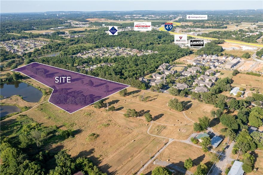 Located in the heart of Fayetteville's fastest growing area and adjacent to one of Fayetteville's newest and largest parks.  Near trails that connect to the Razorback Greenway Trail system.  Minutes from the University of Arkansas campus and downtown Fayetteville.  Easy access to I-49.