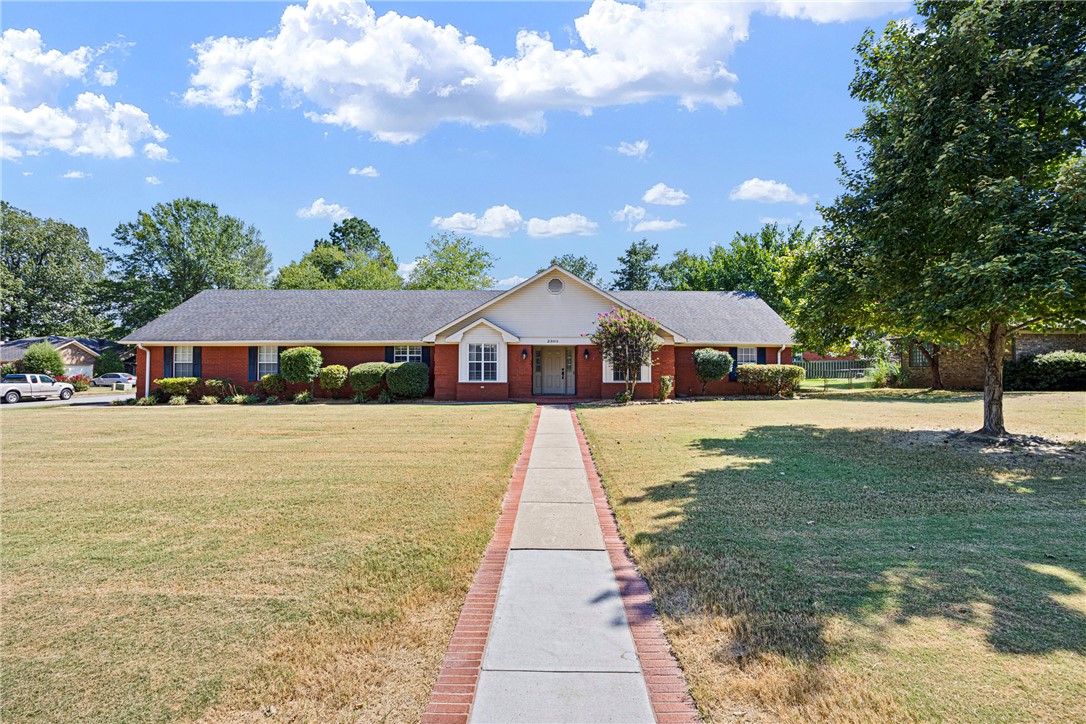 2303 West 5th Street in southwest Russellville offers 2,340 square feet of well-designed living space with 3 bedrooms and 2.5 bathrooms. This home features vaulted ceilings and fireplace in the living room, an office or formal dining room, and a large laundry room. The massive primary suite includes oversized walk-in closets and a spacious bathroom. A 3-car garage provides ample parking and storage, while the corner lot offers extra yard space. Located less than a mile from St. Maryās Hospital, in the Sequoyah school zone, and close to Russellvilleās best amenities, this property blends convenience, comfort, and style in one great package.