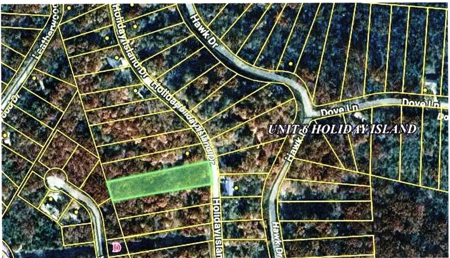 Imagine a place where the pulse of nature meets the ease of resort living. Lot 11 on Holiday Island Drive isn't just a piece of land; it’s your front-row seat to the best of the Ozarks. Nestled in the heart of the prestigious Holiday Island community, this property offers a rare blend of serenity and accessibility. Whether you’re dreaming of a modern architectural retreat or a cozy woodland cabin, this lot provides the perfect canvas. Only one hour to Branson Landing and one hour to Bentonville City Square. Utilities at the street.