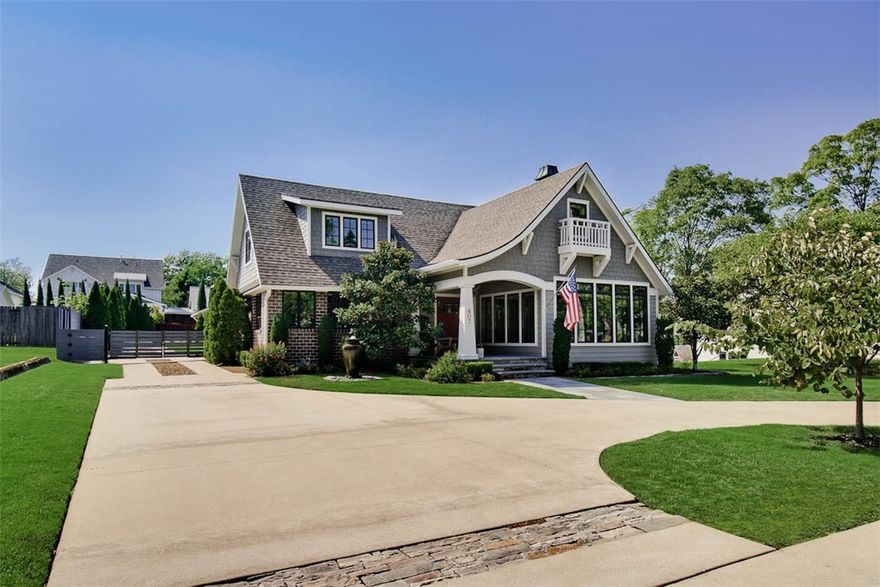 Discover the perfect blend of luxury and location in this beautifully renovated home, just two blocks from the Bentonville Square. Nestled on a generous .36-acre lot, this property offers privacy and is conveniently located across the street from the Compton Gardens and Crystal Bridges trails. This home boasts a 4-car garage as well as elegant living spaces including a sunroom. The spa-like primary bath features a steam shower and heated floors. Entertainment options include an in-ground pool with a waterfall. There’s also a finished basement equipped with a reinforced wine cellar/safe room and an upstairs bonus room, offering extra space for a home office, gym, or playroom. The charming carriage house adds unique character and additional living space to this exceptional property. High-end finishes throughout. Whether you’re seeking luxury or convenience this home delivers on every front!