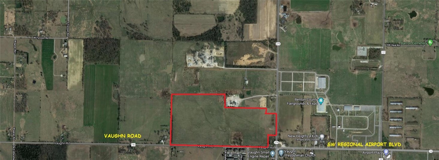 Highly visible lot in prime location at the intersection of SW Regional Airport Blvd and Vaughn Rd. A perfect spot for any business or subdivision. Located near the Wal-Mart Distribution Center.
