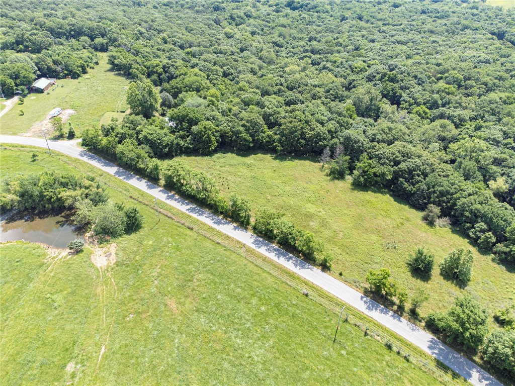 BUILD YOUR DREAM HOME! Are you looking for a rural location to place some roots and build your dream home or hobby farm? Look no further! This 3.40 Acre tract off of Greasy Valley road in Prairie Grove is just what you have been waiting for! Located 10 minutes away from Lincoln and Prairie Grove, this tract is perfect for those looking for privacy while being a short drive from town amenities such as shopping, parks, and more! On site septic needed. Rural Water tap needed. Don't miss out! Act now!