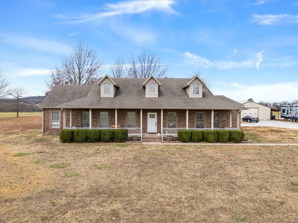 Location, location! This beautiful 3 bedroom 3 bath, recently updated home sitting on 6.75 acres just a stones throw from downtown Prairie Grove offers a perfect blend of modern living & country charm. Step inside to an open-concept layout that seamlessly integrates the living, dining, & kitchen areas. The kitchen is a chefās dream, featuring modern appliances, a gas range, and abundant cabinet space for all your cooking essentials. The home also boasts a spacious walk-in laundry room complete with a sink and extra cabinets for added storage. The primary suite is a retreat, offering a primary bath with a walk-in shower, double sinks, and ample closet space. 30x50 insulated shop with HVAC. Come see all this wonderful home has to offer! Rural living that PG is known for with all the amenities at your fingers!
