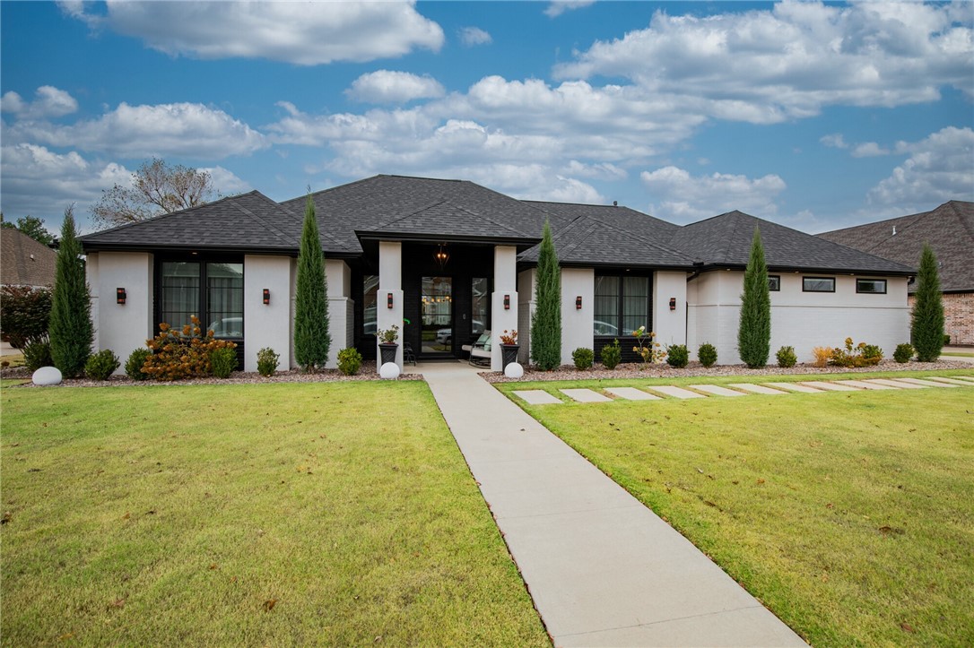 Discover true luxury in this fully renovated & expanded home in the Pinnacle subdivision. Nearly double its original size, this home has been meticulously updated with brand-new electrical, plumbing, HVAC, and roof, ensuring long-term reliability & comfort. This property has it all, with a thoughtfully redesigned layout, including relocated rear garage access with drive-through ability & stunning new floors throughout. Imagine preparing meals in a gourmet kitchen equipped with quartz countertops, top-of-the-line appliances, a six-burner range, wine fridge, wet bar, & custom cabinetry, all complemented by a hidden pantry. The design prioritizes versatility & accessibility, featuring a wheelchair-accessible in-law suite & an upstairs living area/guest quarters, both complete with full baths. The backyard offers ample space for a pool, outdoor kitchen, or any vision you can imagine. Don’t miss the chance to make this home yours—it's more than a house; it’s a lifestyle upgrade. *No 'For Sale' sign at the home*