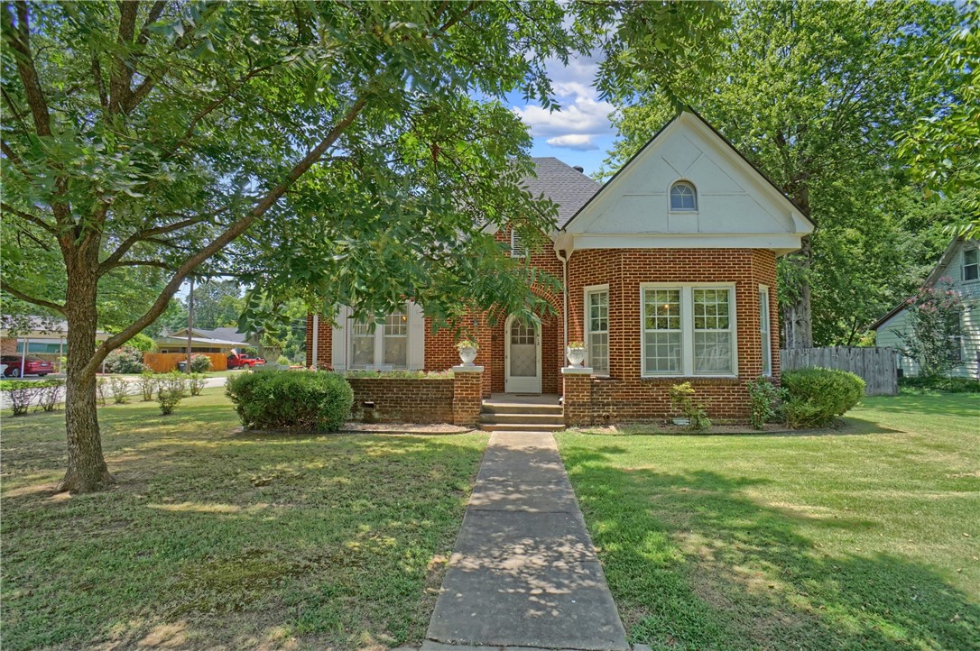 This home is a must see in the heart of historic downtown Russellville! Immediately upon entering the unique arched front door, youāll be transported to an era where craftsmanship met comfort and life was a little simpler. 3 bedroom, 2.5 bathroom home located just a short drive to Lake Dardanelle and the Ozark Mountains to enjoy fishing, hiking, mountain biking & more. This spacious home offers 2,076 sqft of living space, including 374 sqft of unfinished attic space accessible by staircase ā perfect for future expansion and extra storage. Features include a well-maintained kitchen with vintage charm, formal dining room and an abundance of natural light throughout ā all designed when every detail had purpose. Enjoy your morning coffee on the front patio, grill under the covered back patio or spend late nights in the detached shop located in a fenced-in backyard. All situated in a quiet neighborhood, just minutes from Arkansas Tech. This home is priced to sell, so donāt let it pass you up. Set up a showing today!
