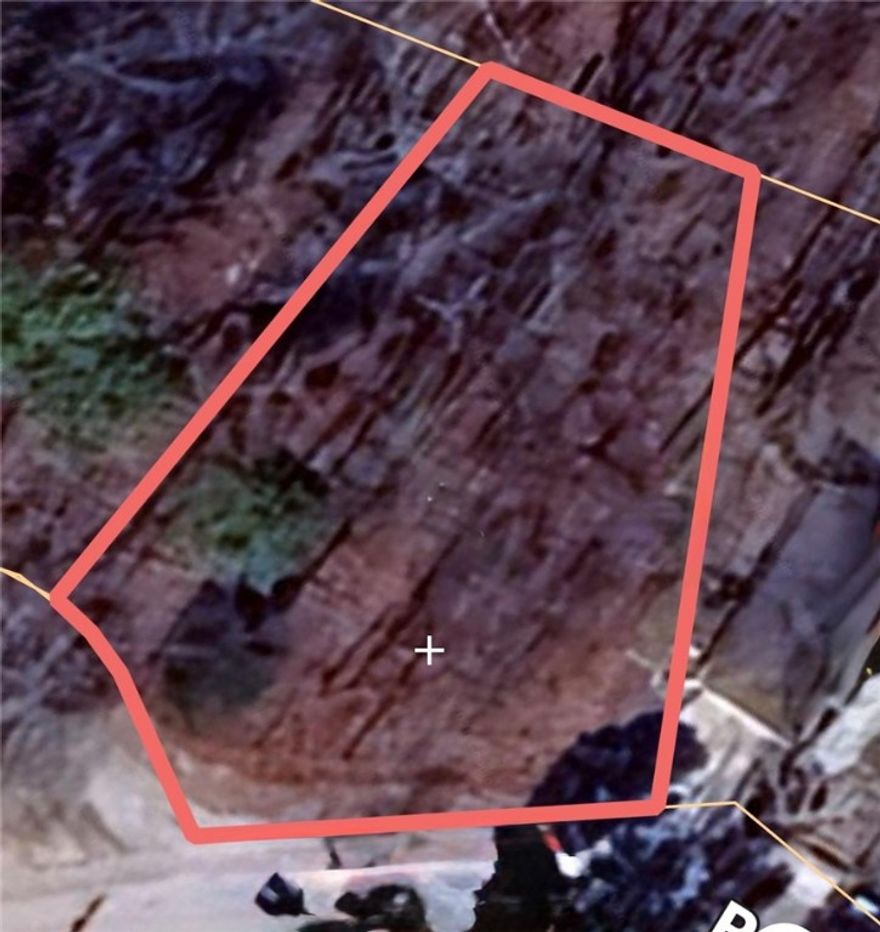 Fantastic building lot that is a 1/4 mile from the Back 40 Trail. Perk test is available.