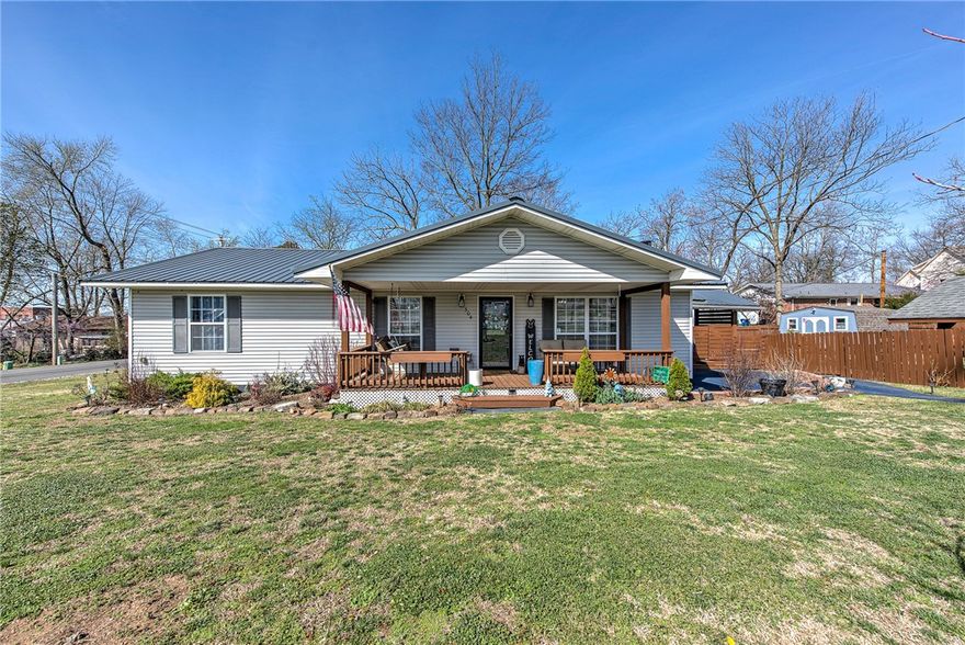 Storybook cottage with a classic, inviting front porch that welcomes you in from the moment you arrive. Pictures truly don’t do it justice—this is a must-see in person! Fully remodeled in 2020, this 2-bedroom + den home features an open floor plan perfect for everyday living and entertaining. Major updates include a new HVAC system (2024), roof (2018), and hot water heater (2018), offering peace of mind for years to come. The large yard provides plenty of space for play, gatherings, and outdoor enjoyment. Outside, you’ll find a detached oversized two-car garage, an additional two-car carport, and a spacious 16x20 shed—ideal for storage, hobbies, or weekend projects. A perfect blend of charm, updates, and livability—ready to enjoy from day one.