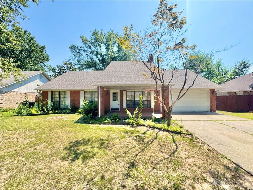 Charming brick home in a quiet, established Rogers neighborhood—minutes to everything. Inside, enjoy faux-wood floors in the living room, plush carpeted bedrooms, vaulted ceiling and cozy fireplace with custom built-ins. Ceiling fans and blinds throughout. Relax on the covered front porch or the screened back patio overlooking a fenced yard shaded by mature trees. Enclosed 2-car garage. Prime location with quick access to I-49, the Pinnacle Hills Promenade, and Malco Pinnacle Hills Cinema for shopping, dining, and movies. Love the outdoors? Hop on the Razorback Regional Greenway to explore miles of connected trails, parks, and nearby downtown Rogers. Close to Rogers schools, including Reagan Elementary, Oakdale Middle, and Rogers Heritage High. This inviting home blends comfort and convenience—schedule your tour today!