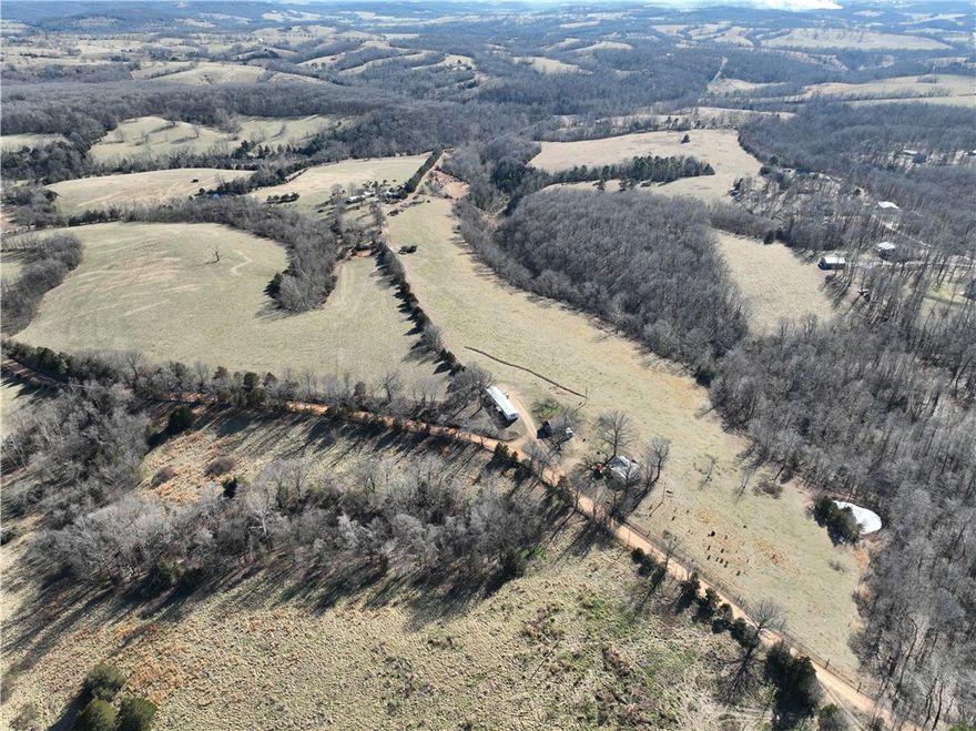 Auction Opportunity – 7 Prime Tracts North of Huntsville, AR - April 2nd @ 9 am 
Exceptional opportunity to purchase from 10 to 60± acres in a 7-parcel real estate auction located 4 miles north of Huntsville, Arkansas. This beautiful family cattle ranch offers a rare combination of productive pastureland, scenic hilltops, and multiple potential homesites. Each tract features rolling terrain with elevated building sites providing panoramic views of the surrounding countryside. Available utilities make this Ideal for custom homes, mini-farms, recreational retreats, or continued agricultural use. Whether you’re looking for a manageable 10± acre homesite or up to 60± acres for ranching or investment, these parcels offer flexibility and long-term potential in a desirable Madison County location across the road from Withrow Springs State Park. *Single wide mobile home currently used as rental* Auction terms apply.  Pre-Auction offers will be considered until March 18th 2026 @ 5pm