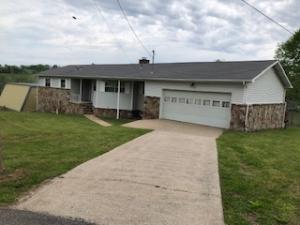 A must see house with large outbuilding located on corner lot within walking distance to Alpena Preschool and High School; HVAC updated 2018; has semi-finished half basement with plumbing and walk out access, includes add'l open lot behind house