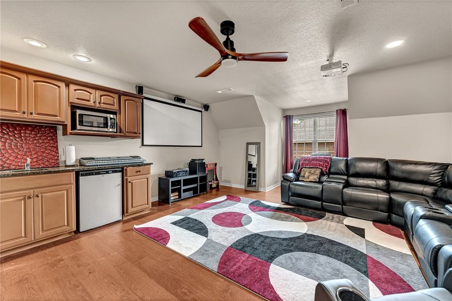 Welcome to your private retreat in the middle of it all! This stunning home sits on nearly 2 acres and offers the perfect combination of space, comfort, and thoughtful upgrades. Inside, youāll find 5 spacious bedrooms each with walk-in closets in 4 bedrooms. A basement bedroom includes a private exterior accessāgreat for guests, extended family, or extra privacy. The main level impresses with two inviting living areas, a formal dining room, home office, and a kitchen that shines with brand-new quartz countertops and abundant cabinetry. Youāll love the new wood flooring adding a fresh feel to every space. Step outside to the newly extended deckāperfect for morning coffee or evening gatheringsāand enjoy movie nights in your very own home theater room. With high ceilings, generous storage, and a location that puts you minutes from everything in NWA, this home checks every box. Seller is offering a one year 2-10 Warranty.