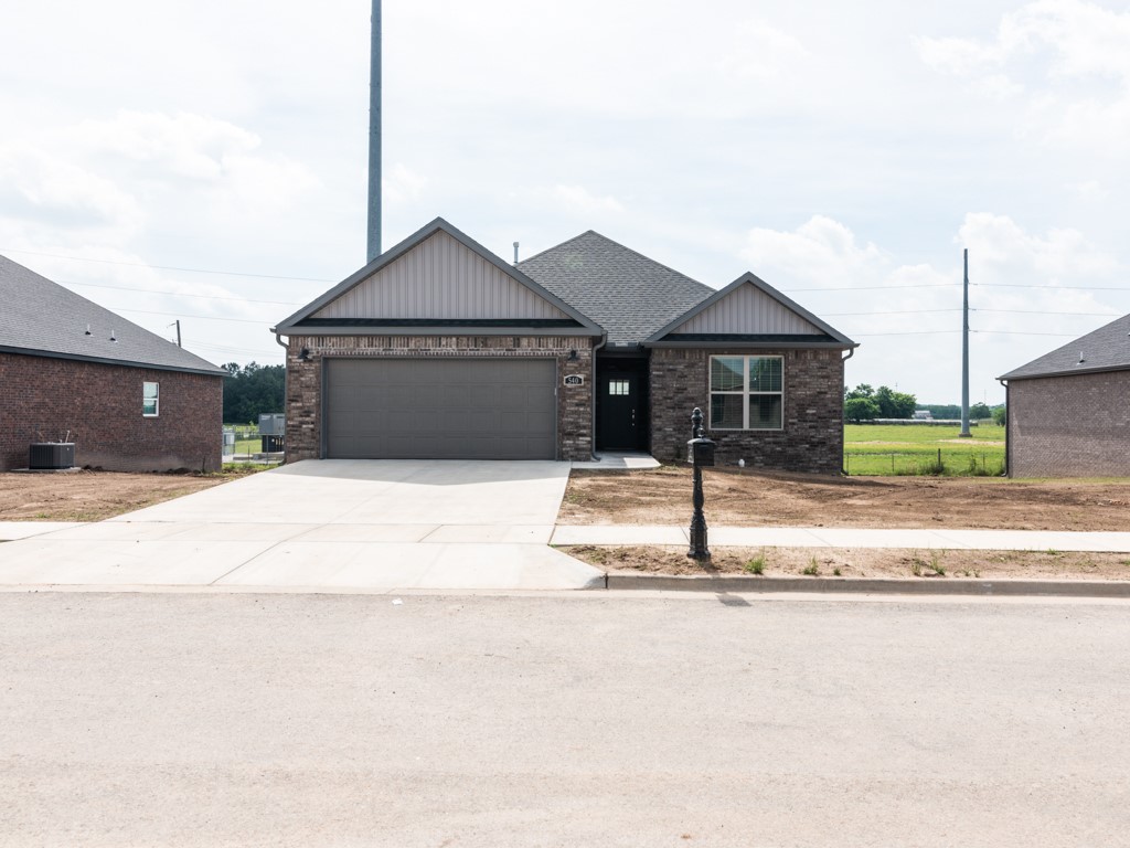 4 bedroom 2 bath all brick home. Centrally located between Bentonville /Centerton. White shaker style cabinetry, large farmhouse sink, black granite, Island bar, gas stove, split plan, & beautiful tile wood look flooring throughout with carpeted bedrooms. Appliance package w/ washer & dryer. Covered deck.