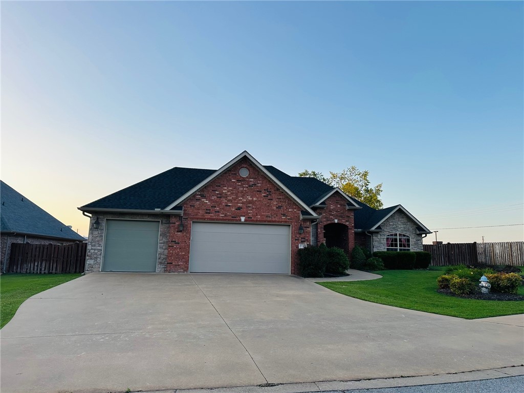 4 bedroom/3 bath home with pool! Split floorplan. 2 living areas, eat-in-kitchen, dining room area. Primary bedroom has fireplace! 3 car garage, beautifully landscaped front yard. Convenient to shopping and Razorback Greenway nearby. New roof March 2024.