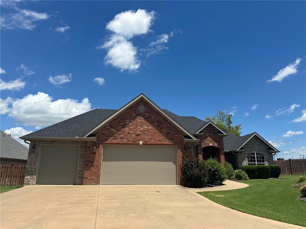4 bedroom/3 bath home with pool! Split floorplan. 2 living areas, eat-in-kitchen, dining room area. Primary bedroom has fireplace! 3 car garage, beautifully landscaped front yard. Convenient to shopping and Razorback Greenway nearby. New roof March 2024.