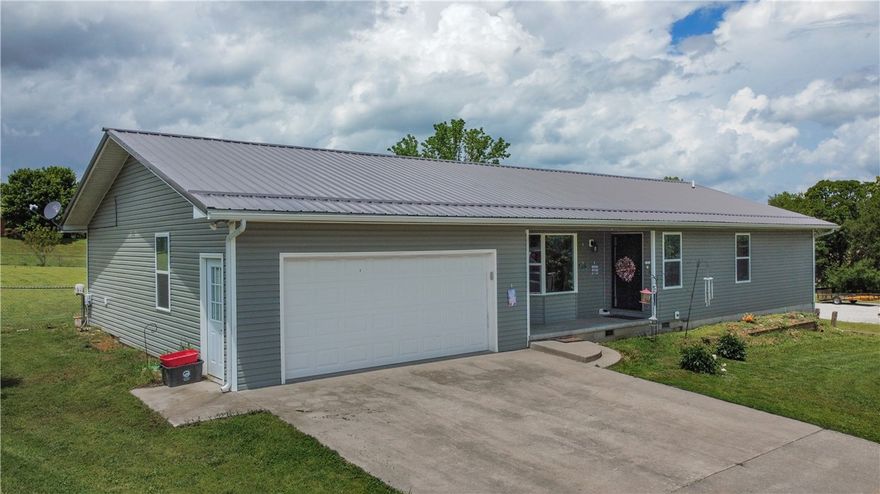 Wow! Beautiful 4 bedroom, 3 bath home on 1.73 acres M/L with almost 3/4 of the acre fenced in. This home has been completely remodeled and has a gorgeous large family kitchen with all new appliances. The granite bars are a great place to sit and dine or you have a lovely area for a sit down dinner with the family. Open living room on the main floor plus a Master bed and two smaller bedrooms. In the basement, there is a very nice room for work or play plus another master suite with it's own bathroom. Outside, there is a covered deck/patio that is approximately 700 sq. ft. Then, a large 1100+ sq. ft. shop building. Electric in the building plus most of the floor is concrete. It also has a couple of storage areas and it is partially insulated. Flooring is new with both bamboo and life proof wood floors. Cable television is available in all bedrooms. Laundry room has cabinets from floor to ceiling. New carpet in living room and hall. Can be purchased as home on .8 acres m/l on MLS 1310352
