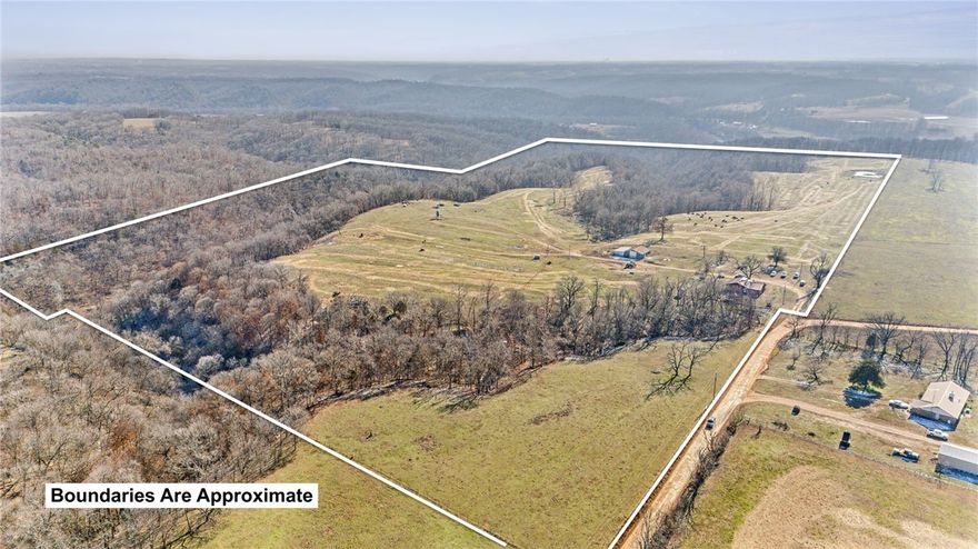 Nestled on 80 acres of breathtaking countryside, this property offers an unparalleled opportunity to embrace rural living at its finest. The expansive land is perfect for a variety of uses, whether you’re looking to farm, ranch, or simply enjoy the wide-open space. The 3 bedroom, 2 bath brick home offers a blend of comfort and rural serenity. A 4-stall barn is conveniently located on the property, ideal for livestock, equestrian activities, or extra storage. A year-round creek flows through the acreage, creating a serene atmosphere and adding natural beauty to the landscape, along with driving trails that curve around the property. This 80-acre property truly offers a rare opportunity to own a piece of tranquil, functional land—whether you're envisioning a hobby farm, a peaceful retreat, ample hunting opportunities or a future legacy property. Come explore the possibilities and make this remarkable piece of paradise your own!