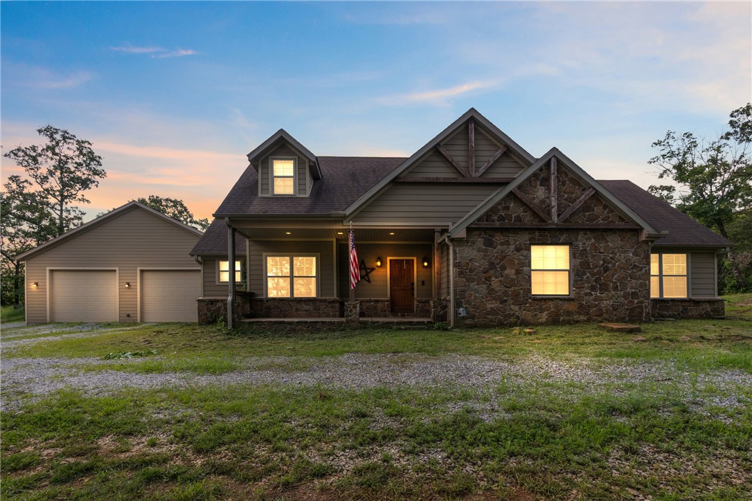 Welcome home to your own private oasis. Convenient to all things NWA but yet secluded! Just a quick drive out of Springdale this home features 5 Beds, 3.5 baths 2 offices, a bonus room and shop with RV Parking to ensure you have everything you need all nestled on 10 beautiful acres! Did I mention the private movie room off the master ensuite? Pride of ownership shows in all the details! Way too many details to list so call today and come see everything this home has to offer. Shop is wired with 220v and no deed restrictions!