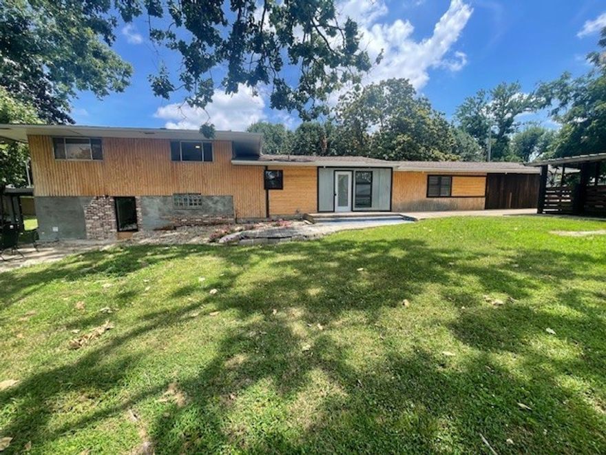 Attention Builders, Investors or Home Renovators. This location can't be beat on the 5 bedroom, 2 bath home on a sprawling .59 acre lot. Right down the street from Greenway and Coler Mt. bike trails, minutes to downtown Bentonville. Home can be renovated to suit your needs, or you could split the lot and build multiple homes. Don't miss your opportunity to own this property in this location. Home is sold as-is. Tons of potential. Seller offering $10,000 seller concessions.