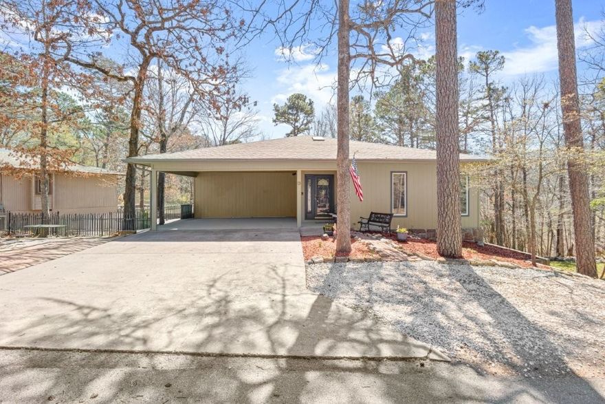 Storybook charm meets spacious living in the 2,598 SF cottage style home filled with natural light from large windows and skylights. The upgraded kitchen features granite counters, large island, stainless appliances, double ovens and gas cooktop. Enjoy upper and lower covered patios, a wood burning stove and 520 SF climate-controlled storage/workshop near Lake Rayburn.