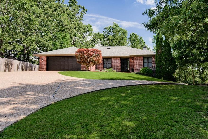 Beautiful 3,078 s.f.  two-story home in a quiet neighborhood with a large, partially covered back deck offering stunning forest views—perfect for relaxing or entertaining. Bright open-concept main level with vaulted ceilings, wood-burning fireplace, surround sound, and updated kitchen with 2025 granite countertops, large stainless undermount sink, stainless appliances, and rollout shelves. Spacious primary suite with walk-in closet and luxurious en-suite bath featuring double sinks, large shower, and extra-large spa jetted tub. Main floor also has a guest bedroom with walk-in closet, an office with custom built-ins/closet, and a spacious laundry room with cabinetry, workspace, and skylight. Walkout basement includes two large bonus rooms, ¾ bath, extra closets, and patio with wooded views. Recent updates: new roof (2021), Energy Star AC/heat system with programmable thermostat (2023), new exterior lighting, luxury plank flooring in bedrooms, and fresh interior paint. Close to Scottsdale Golf Course.