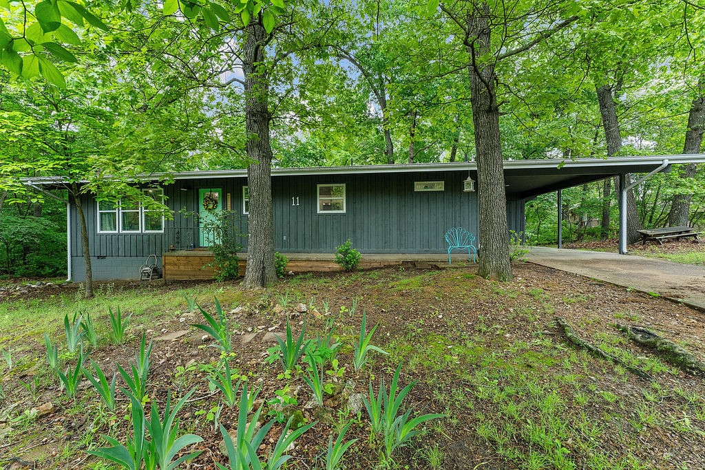 Welcome to your fully remodeled retreat in beautiful Bella Vista, Arkansas! This 3-bedroom, 2-bath ranch-style home has been thoughtfully updated from top to bottom, blending modern comfort with timeless charm— nestled in an amazing location! This beautifully updated 3-bedroom, 2-bath ranch home offers modern comfort in an unbeatable setting. Inside, enjoy brand-new LVP flooring, a stunning kitchen with hammered granite countertops, subway tile backsplash, and remodeled bathrooms. New windows bring in natural light, and a fully upgraded electrical system ensures peace of mind. A new roof and gutters top off the exterior updates, making this home truly move-in ready. Located directly on the Play Thru biking trail and walking distance to Lake Avalon, you’ll also be near Lake Windsor and the Bella Vista Golf Course—perfect for outdoor enthusiasts and nature lovers. Whether you're looking for a full-time home or a weekend escape, this one has it all. Come experience the best of Bella Vista living today!