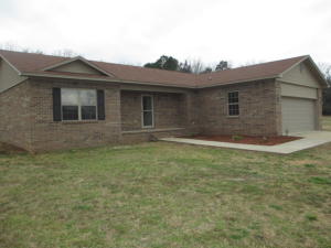 Country Living at its finest, this newly redone home has tons of upgrades including new paint, carpet, moulding, newly surfaced kitchen cabinets and much more. This Brick 3/2 on 2.5 acres is a must see in yell county near the water This large corner lot is on a lazy street for quiet evenings and wildlife. Come see the open split floor plan, large kitchen bar, dining area and double garage.
